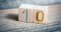 two wooden blocks showing the number ten two wooden blocks showing the number ten
