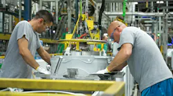 team_members_at_our_ap1_laundry_plant_work_togethe
