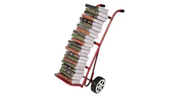 stack of books on a dolly