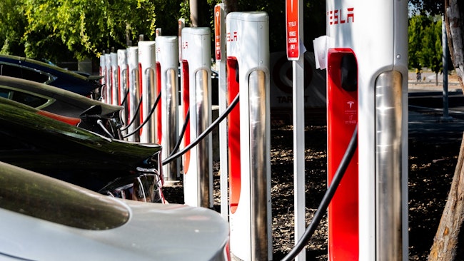 689cb504d09fa4a2b78309fd Chargingstationdreamstime Xxl 146962233