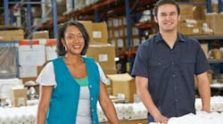Smiling Manufacturing Workers Smiling Manufacturing Workers