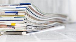 stack_of_newspapers stack_of_newspapers