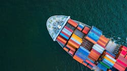 Cargo ship in the open sea. Cargo ship in the open sea.