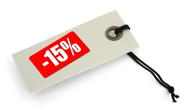 price tag with words that say 15% off