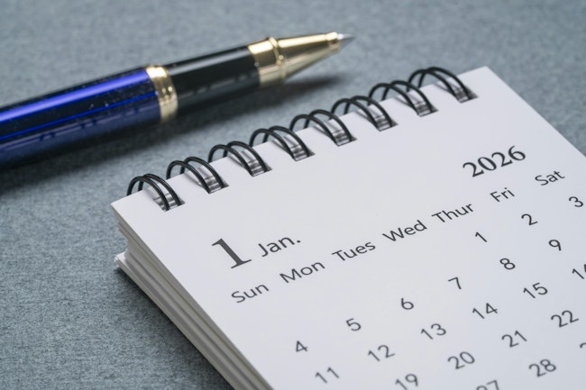 Small spiral desktop calendar showing January 2026