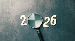 Looking ahead to the year 2026 with a magnifying glass. Looking ahead to the year 2026 with a magnifying glass.
