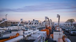 Utility bucket trucks at a Duke Energy basecamp at Charlotte Motor Speedway Utility bucket trucks at a Duke Energy basecamp at Charlotte Motor Speedway