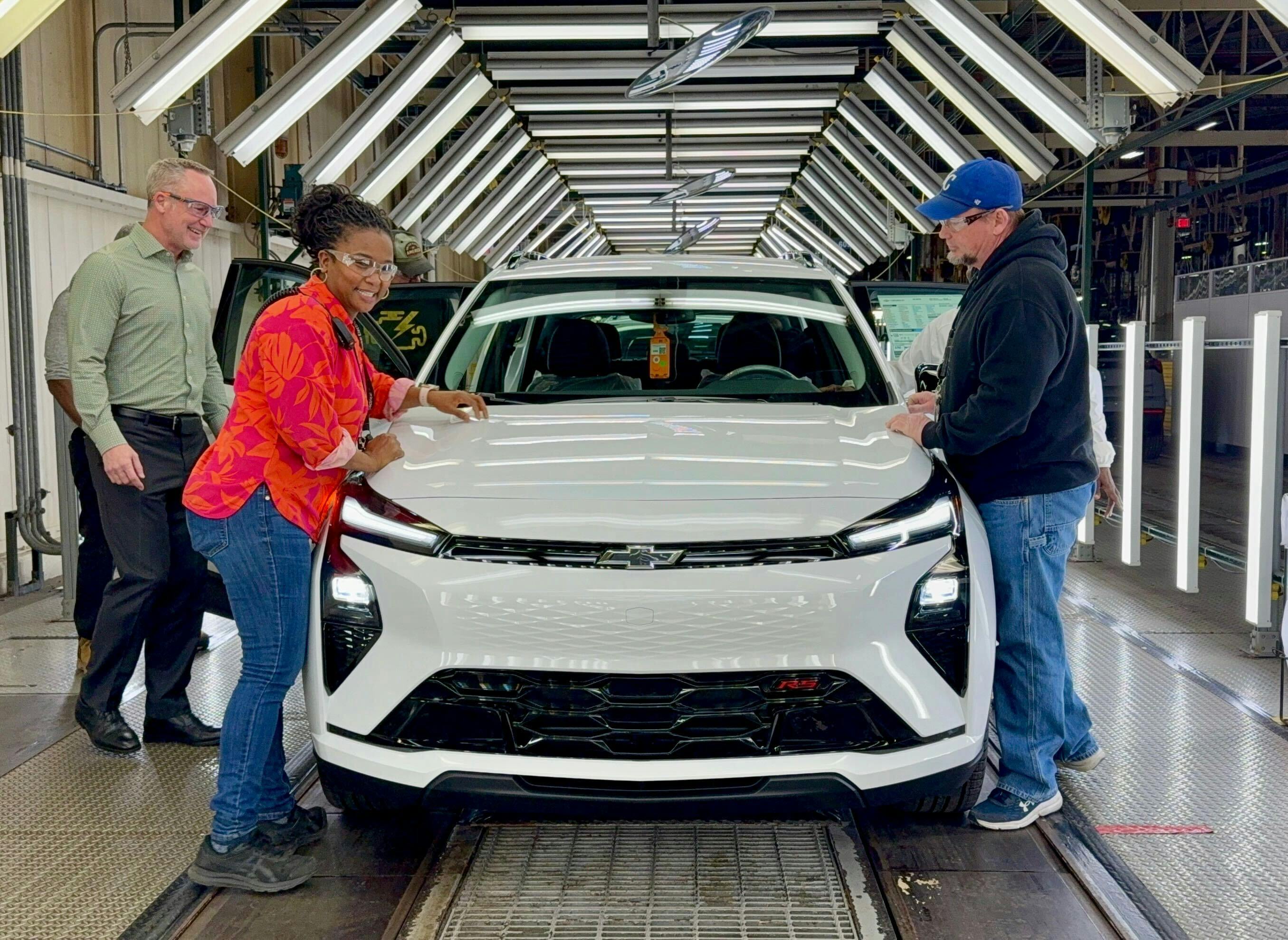 GM employees and a 2027 Bolt at Fairfax Assembly