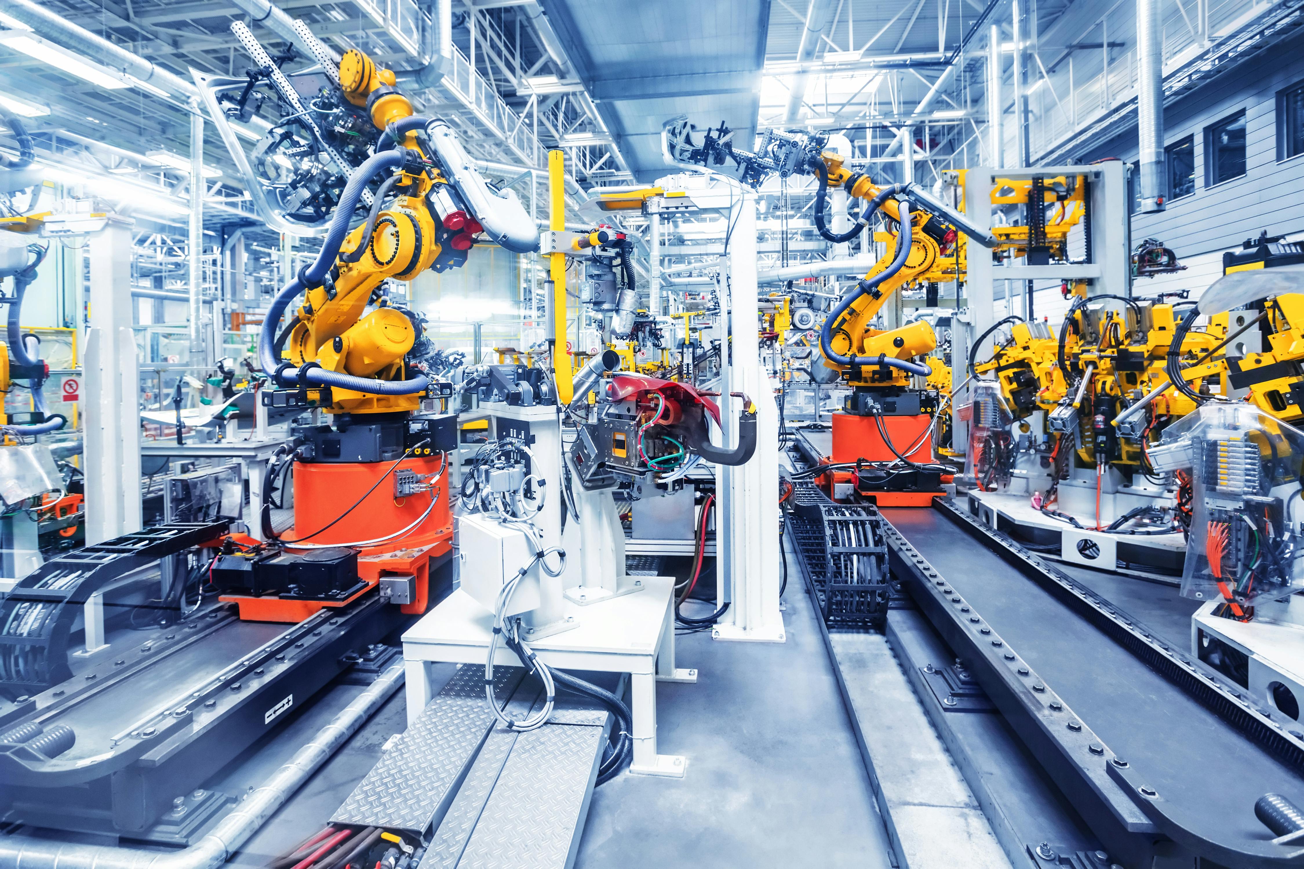 Robots in a car factory.