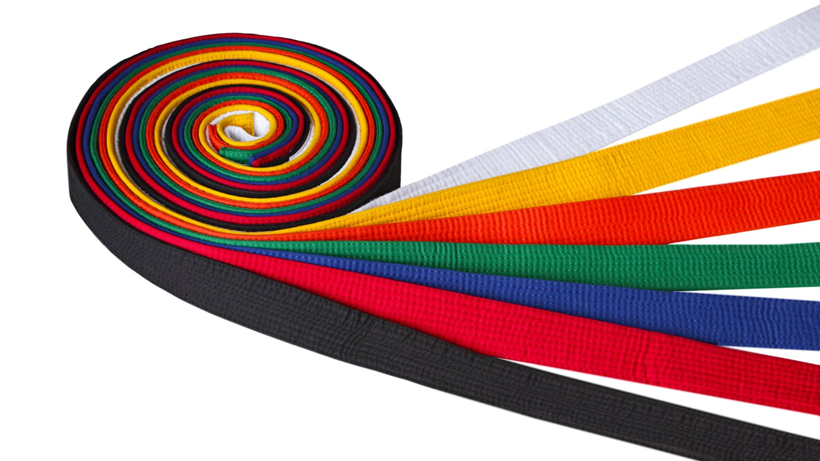 multiple martial arts belts of different colors