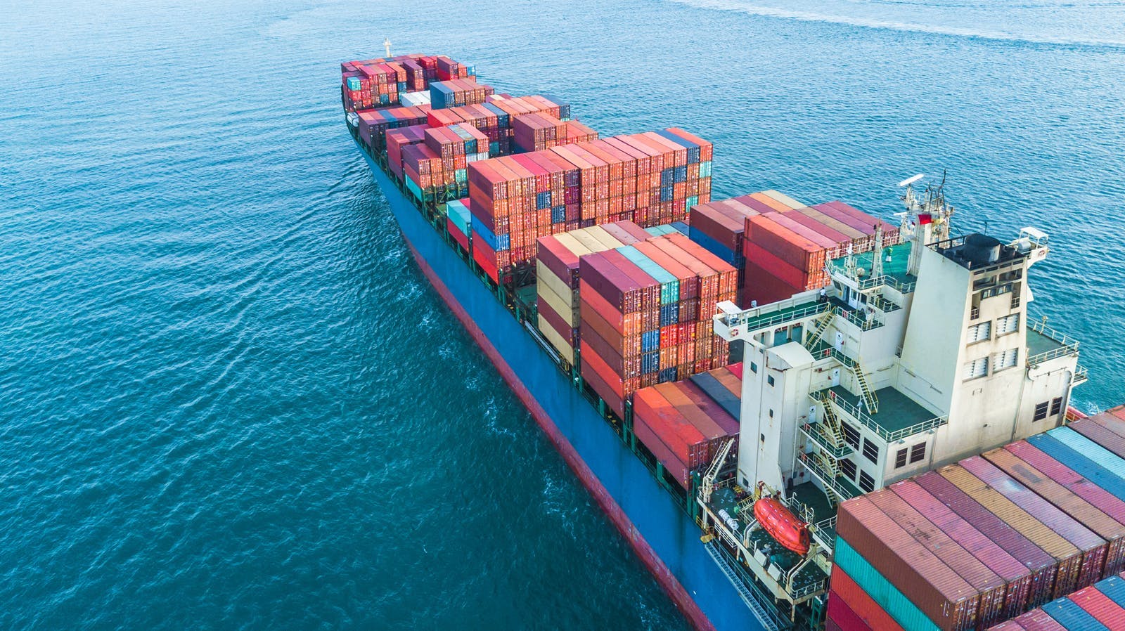 ship carrying freight on the ocean