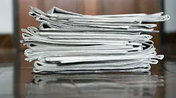 stack of newspapers stack of newspapers