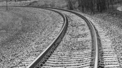 railroad track, veering left. Black and white. railroad track, veering left. Black and white.