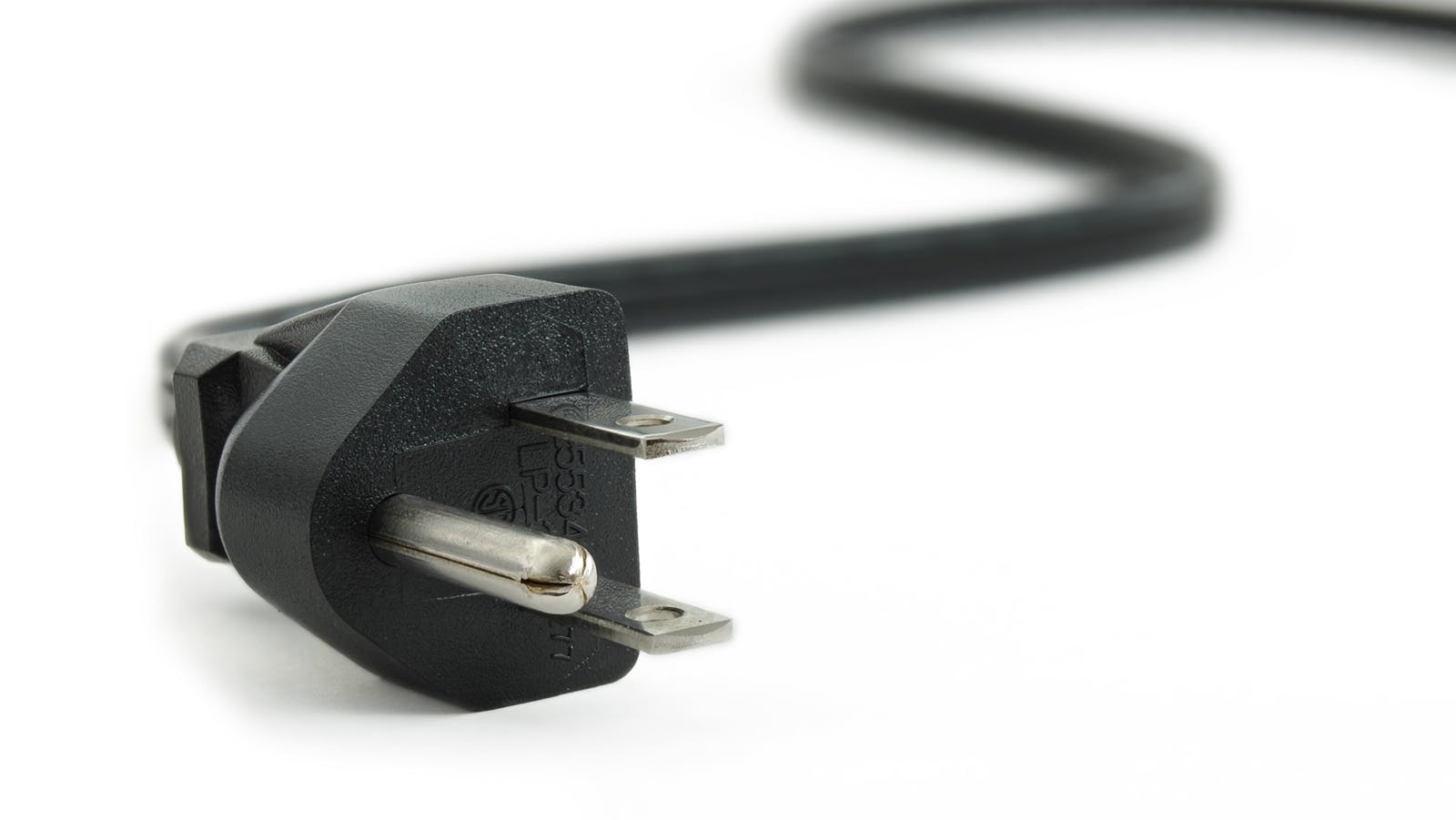 long black electric cord against a white background.