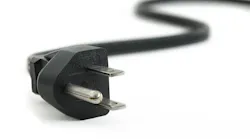 long black electric cord against a white background. long black electric cord against a white background.
