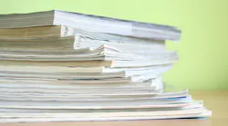 magazine_stack_dreamstime_l_15843975