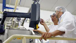 6a7601aac434418cff0ad736 Workers On Automated Line Dreamstime L 19138772