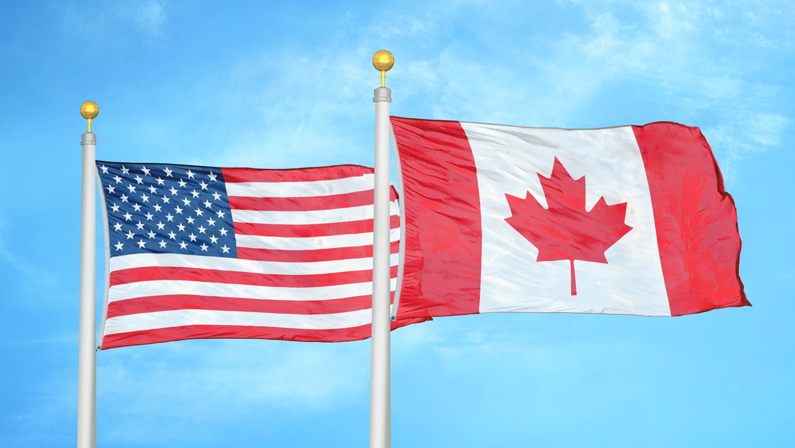 us_canada_flags_dreamstime_l_177241307