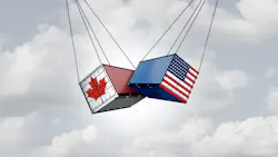 cargo swinging from chains, one is covered in US, the other with Canada