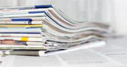 6a9ae8ecc52490efe85d07e5 Stack Of Newspapers