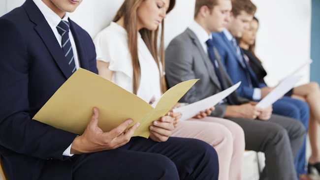 Candidates waiting for job interviews.