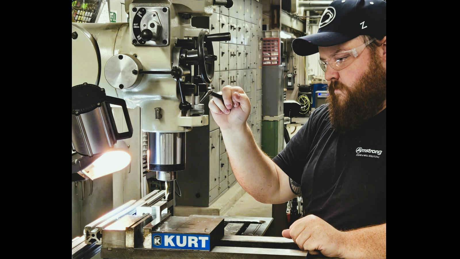 Sam Stoltzfus at a machine