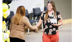 hannah bennett, at right, receives award