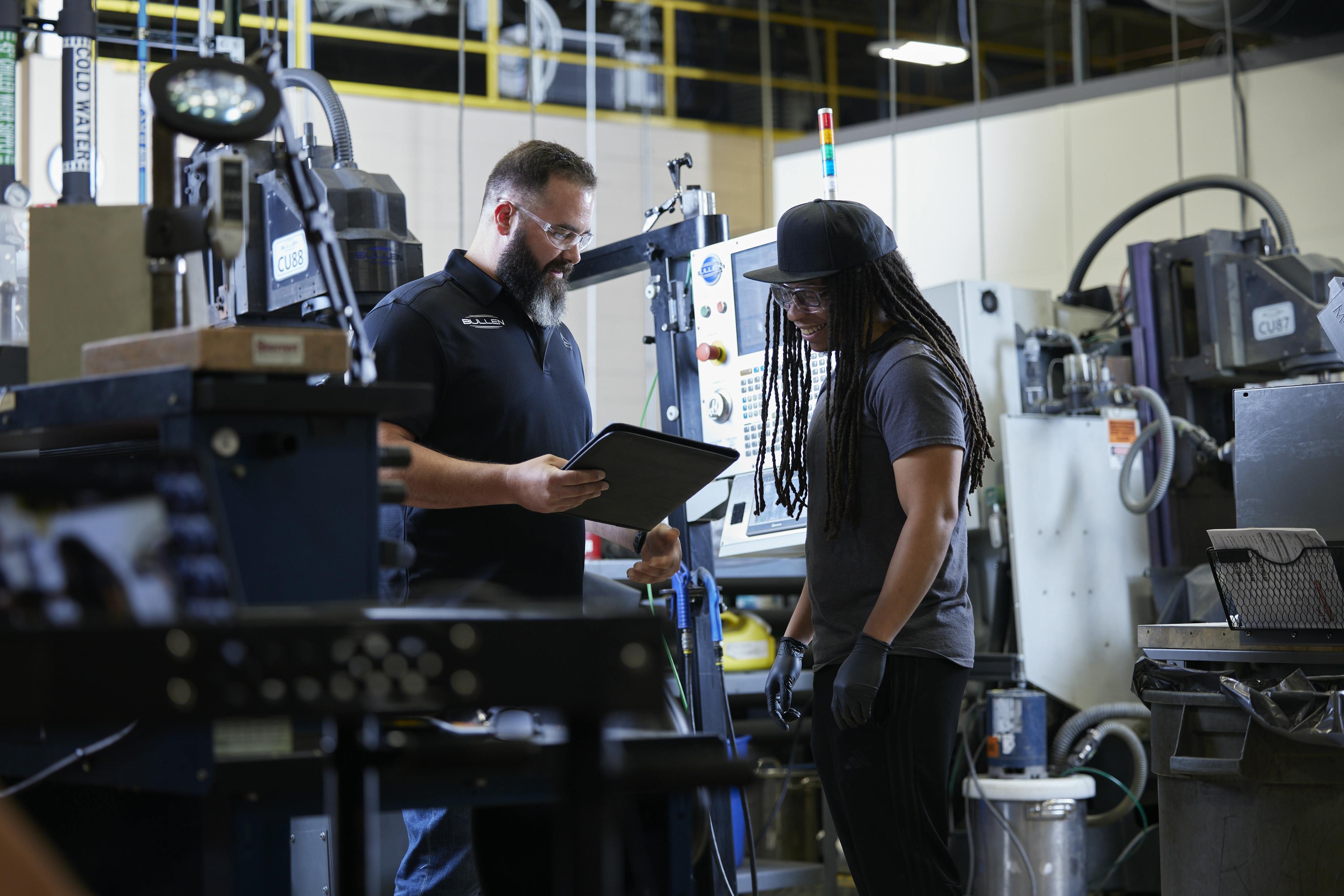 AJ Ganino, Director of Operations and Kaleb Hines at Bullen&rsquo;s ultrasonic machines.
